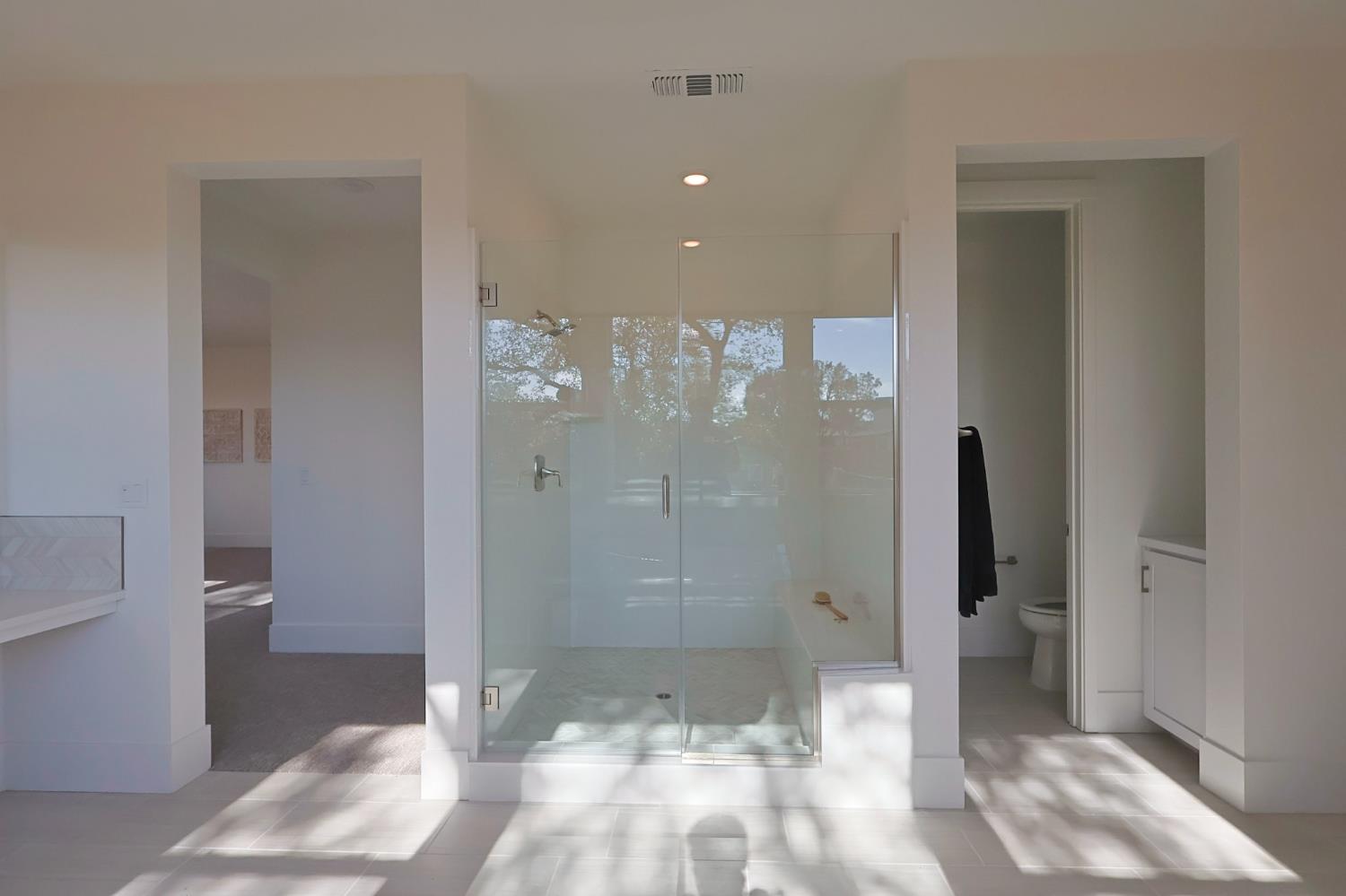 5638 Lakepointe Drive Rocklin, CA 95677 - Photo 15 of 30 a bathroom with a shower and a toilet