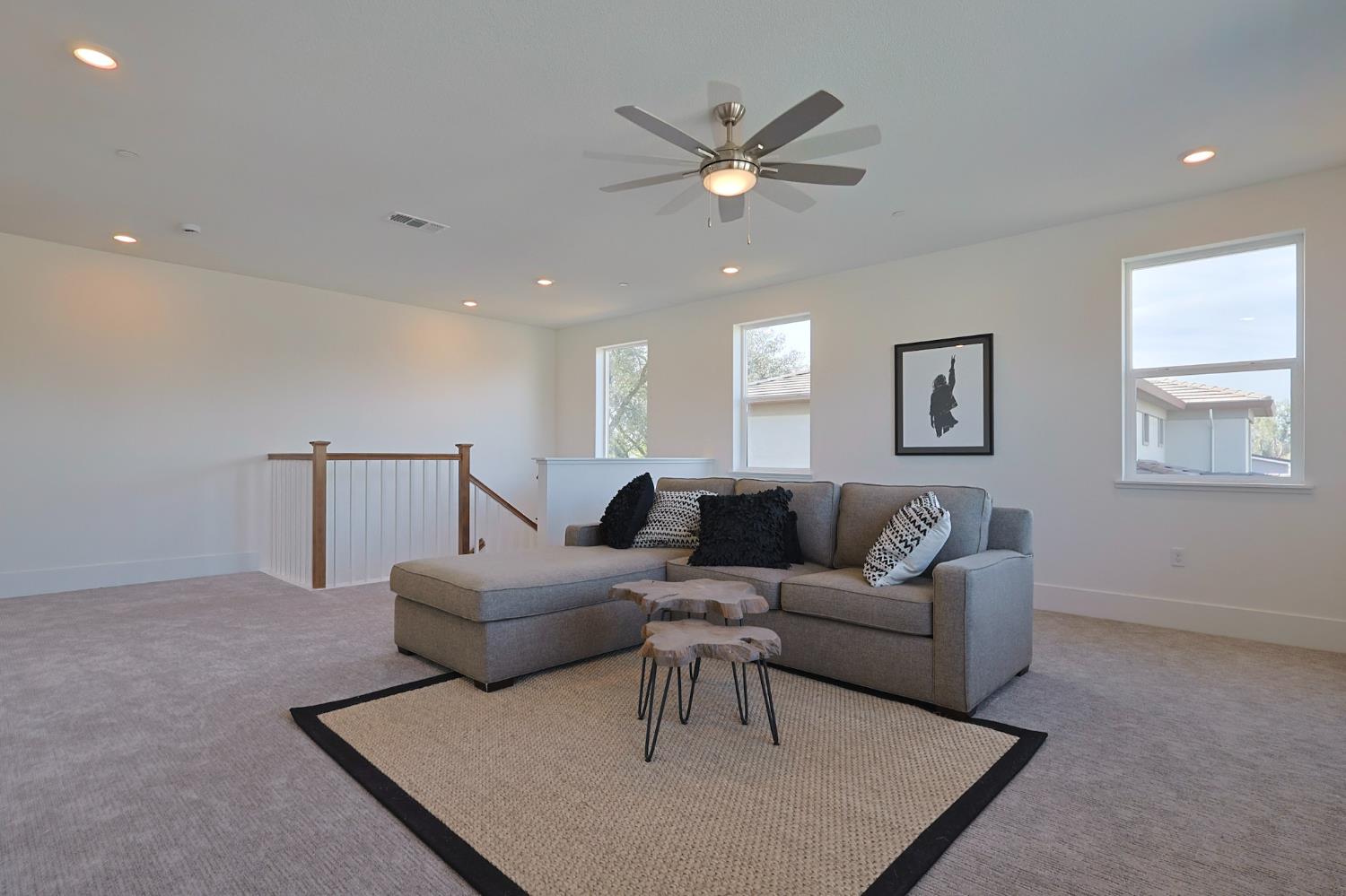 5638 Lakepointe Drive Rocklin, CA 95677 - Photo 20 of 30 a living room with furniture and a window