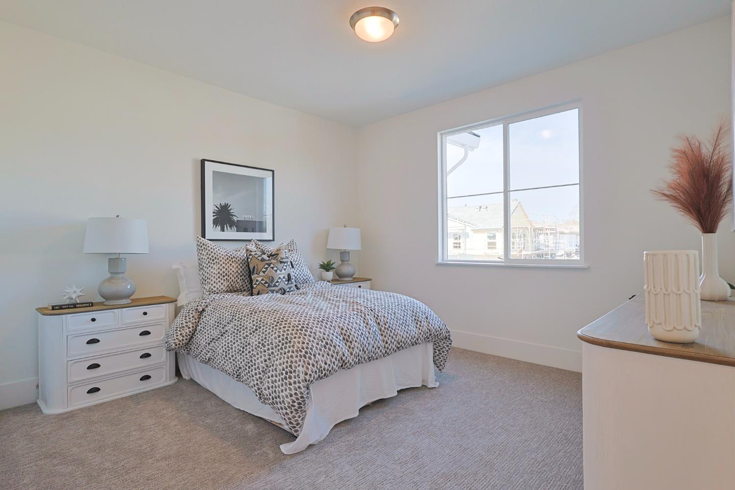 5638 Lakepointe Drive Rocklin, CA 95677 - Photo 21 of 30 a bedroom with a bed and a window