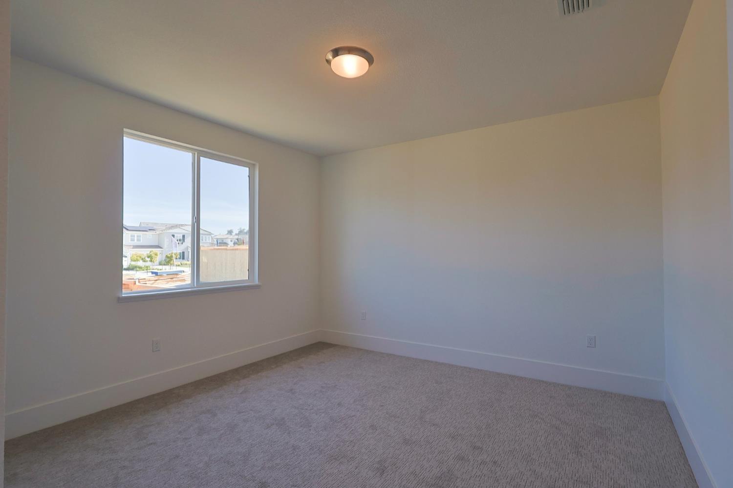 5638 Lakepointe Drive Rocklin, CA 95677 - Photo 25 of 30 an empty room with a window