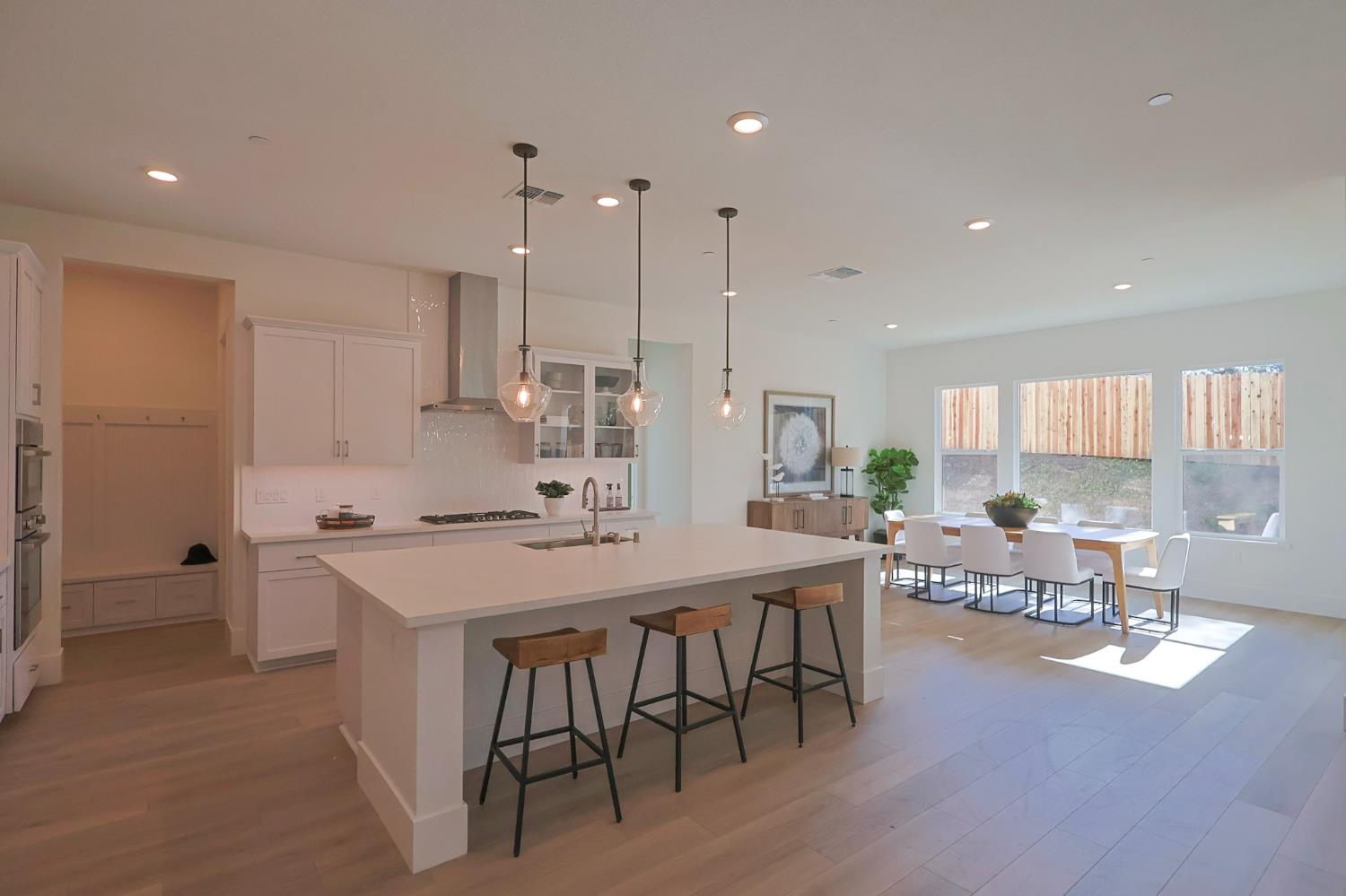 5638 Lakepointe Drive Rocklin, CA 95677 - Photo 6 of 30 a large kitchen with a table and chairs