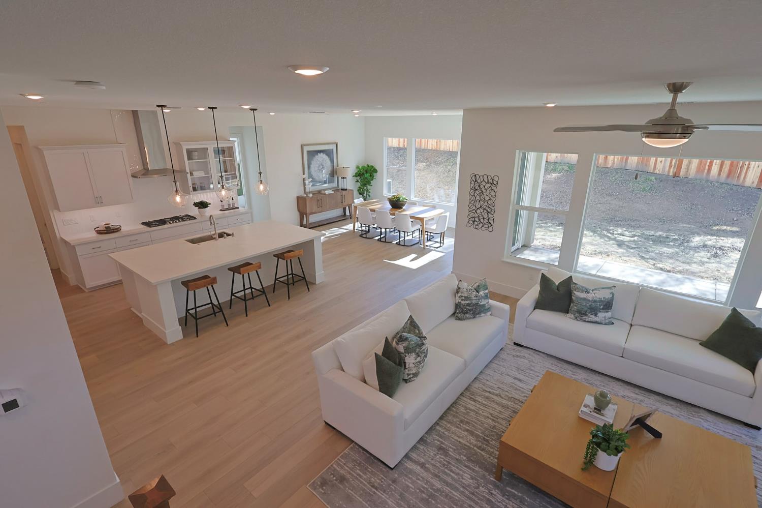 5638 Lakepointe Drive Rocklin, CA 95677 - Photo 8 of 30 a living room with furniture and a table