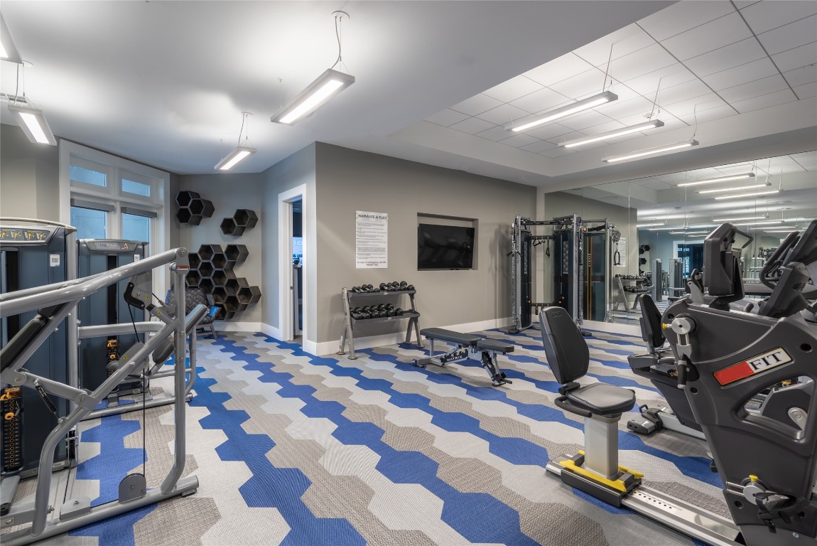 3100 Kramer Lane, Unit 102 Austin, TX 78758 - Photo 14 of 18 a view of a room with gym equipment
