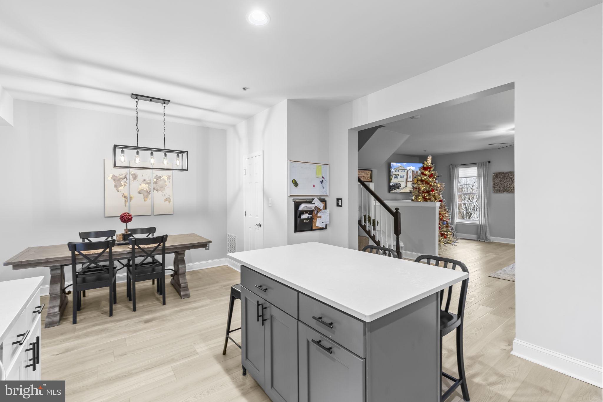 204 Braxton Way, Unit 204 Edgewater, MD 21037 - Photo 19 of 50 a view of a dining room with furniture