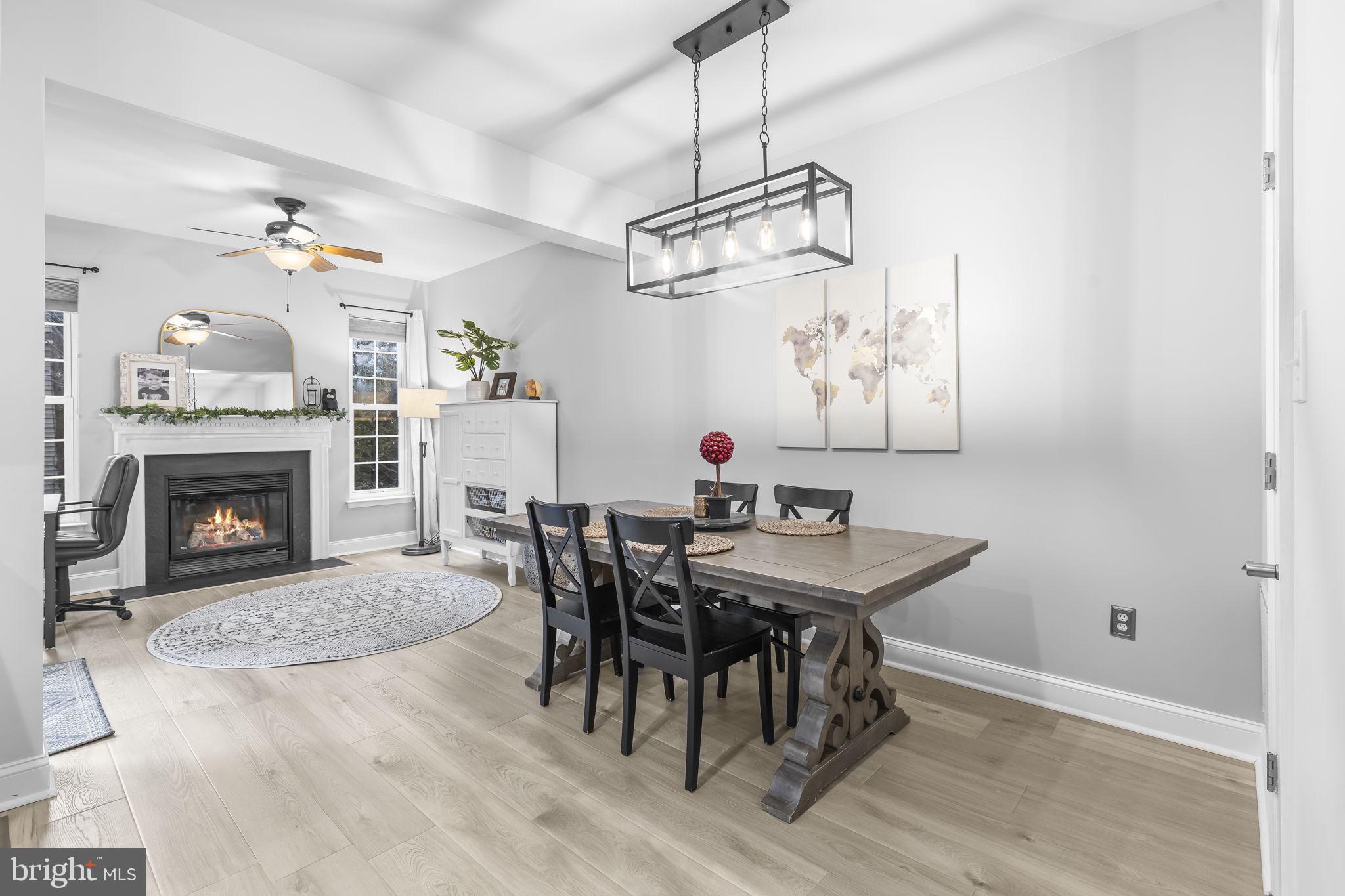 204 Braxton Way, Unit 204 Edgewater, MD 21037 - Photo 22 of 50 a view of a dining room with furniture and chandelier