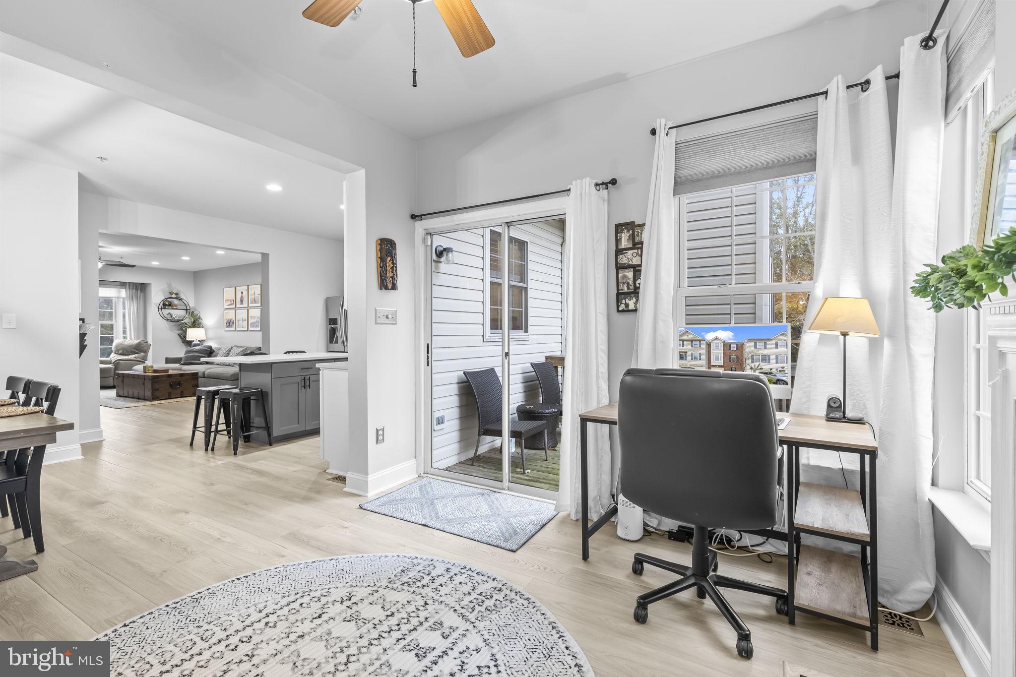 204 Braxton Way, Unit 204 Edgewater, MD 21037 - Photo 24 of 50 a living room with furniture and a large window
