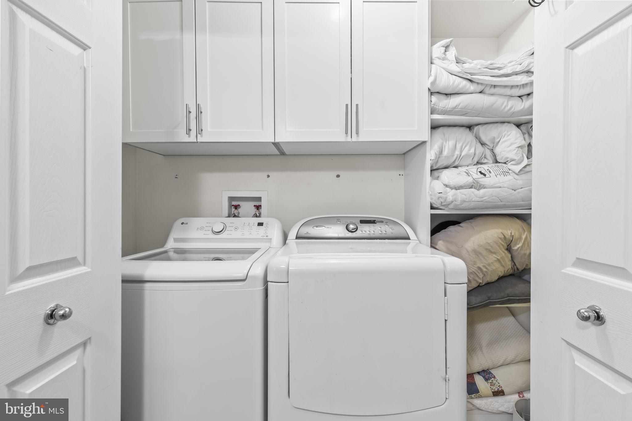 204 Braxton Way, Unit 204 Edgewater, MD 21037 - Photo 43 of 50 a utility room with dryer and washer