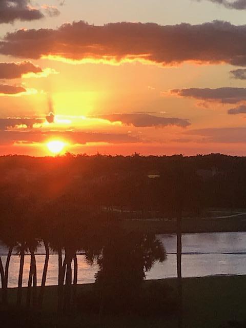 336 Golfview Road, Unit 512 North Palm Beach, FL 33408 - Photo 4 of 53 sunset from the patio