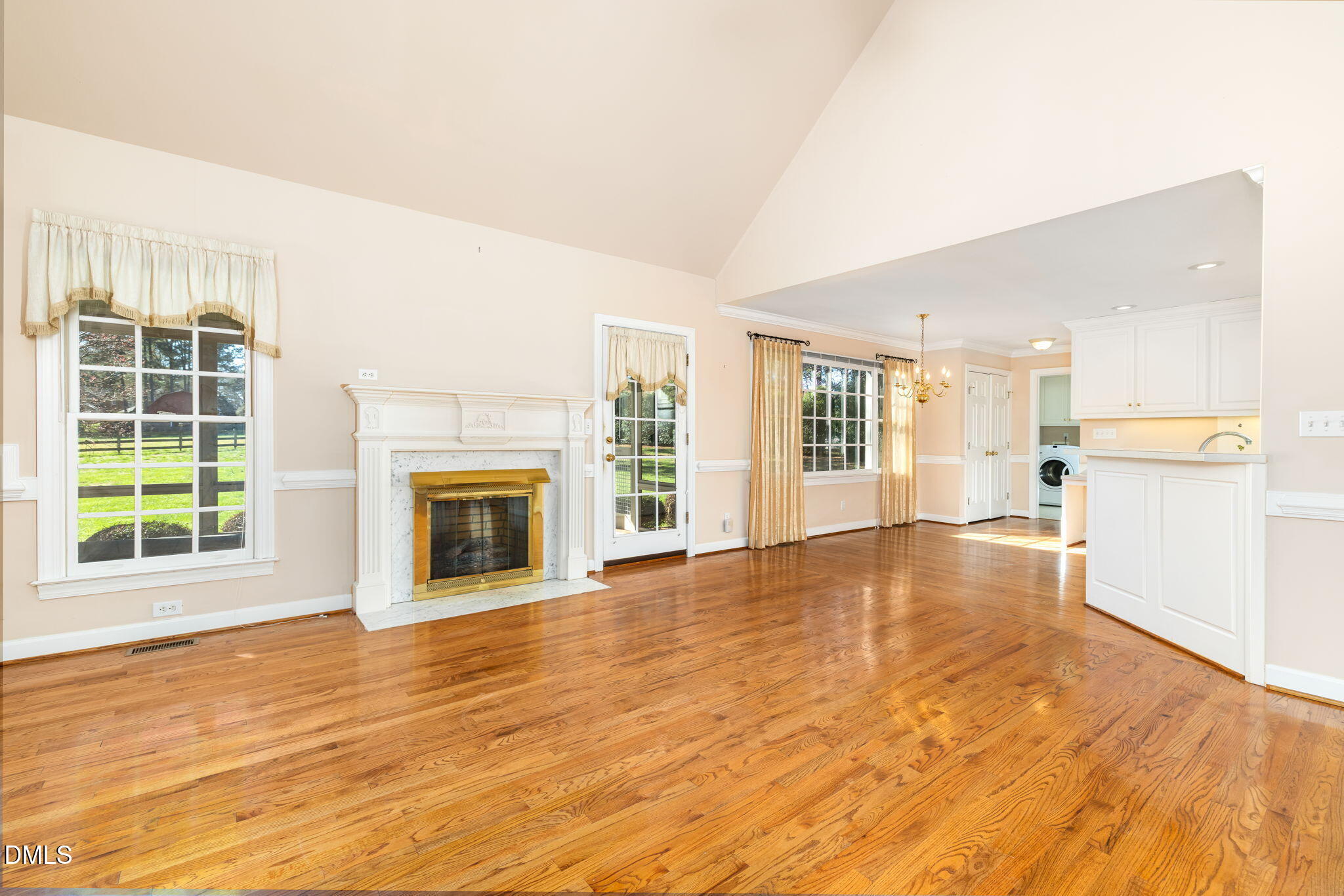 4076 Salem Farm Road Oxford, NC 27565 - Photo 13 of 55 a view of an empty room with wooden floor and a window