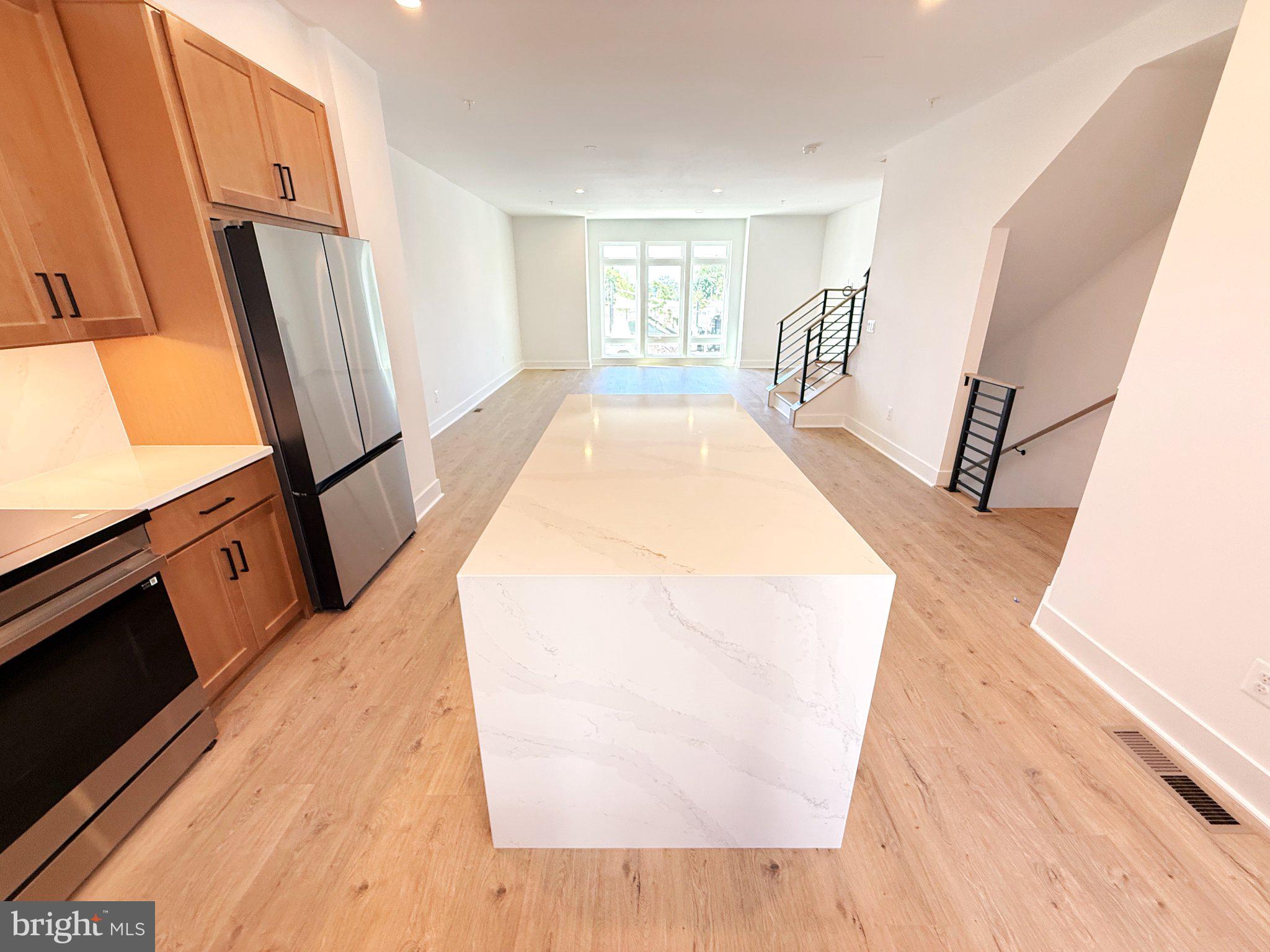 33 Lower Service Court Northwest Washington, DC 20001 - Photo 23 of 51 Modern kitchen with sleek island design.