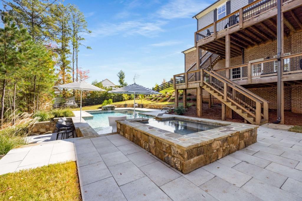 4045 Haven Terrace Milton, GA 30004 - Photo 40 of 46 a view of swimming pool with outdoor seating and plants