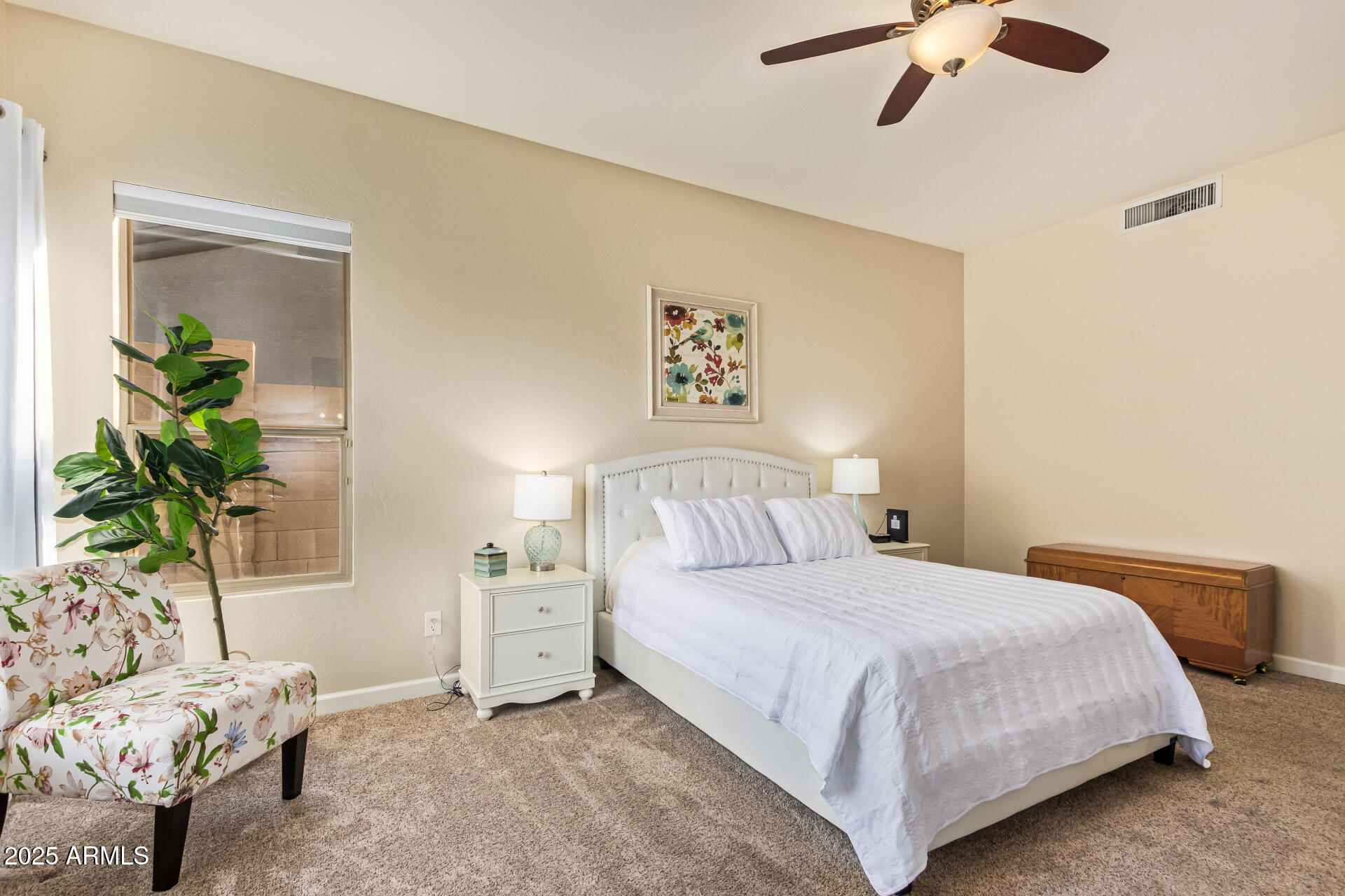 535 South Lemon Court Gilbert, AZ 85296 - Photo 13 of 36 a bedroom with a bed and a window