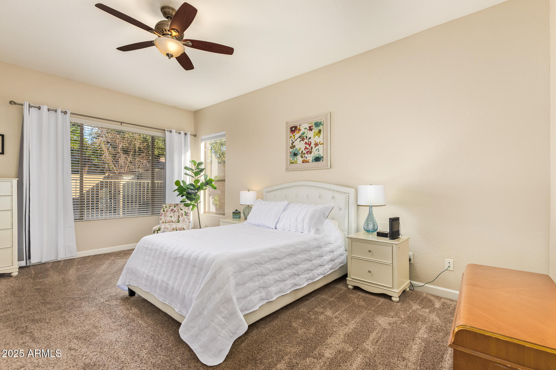 535 South Lemon Court Gilbert, AZ 85296 - Photo 16 of 36 a bedroom with a bed and a large window