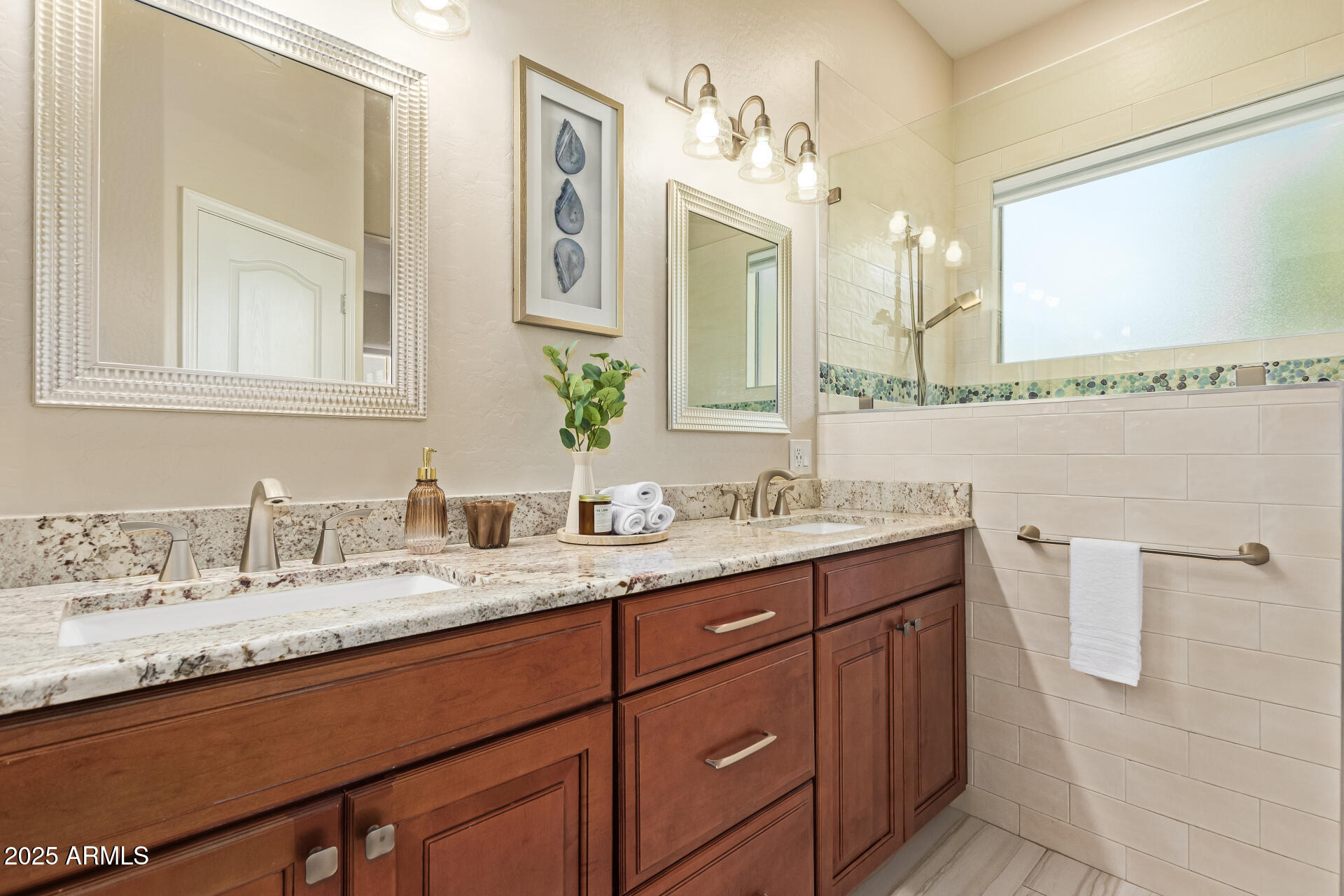 535 South Lemon Court Gilbert, AZ 85296 - Photo 17 of 36 a bathroom with a granite countertop sink vanity and mirror