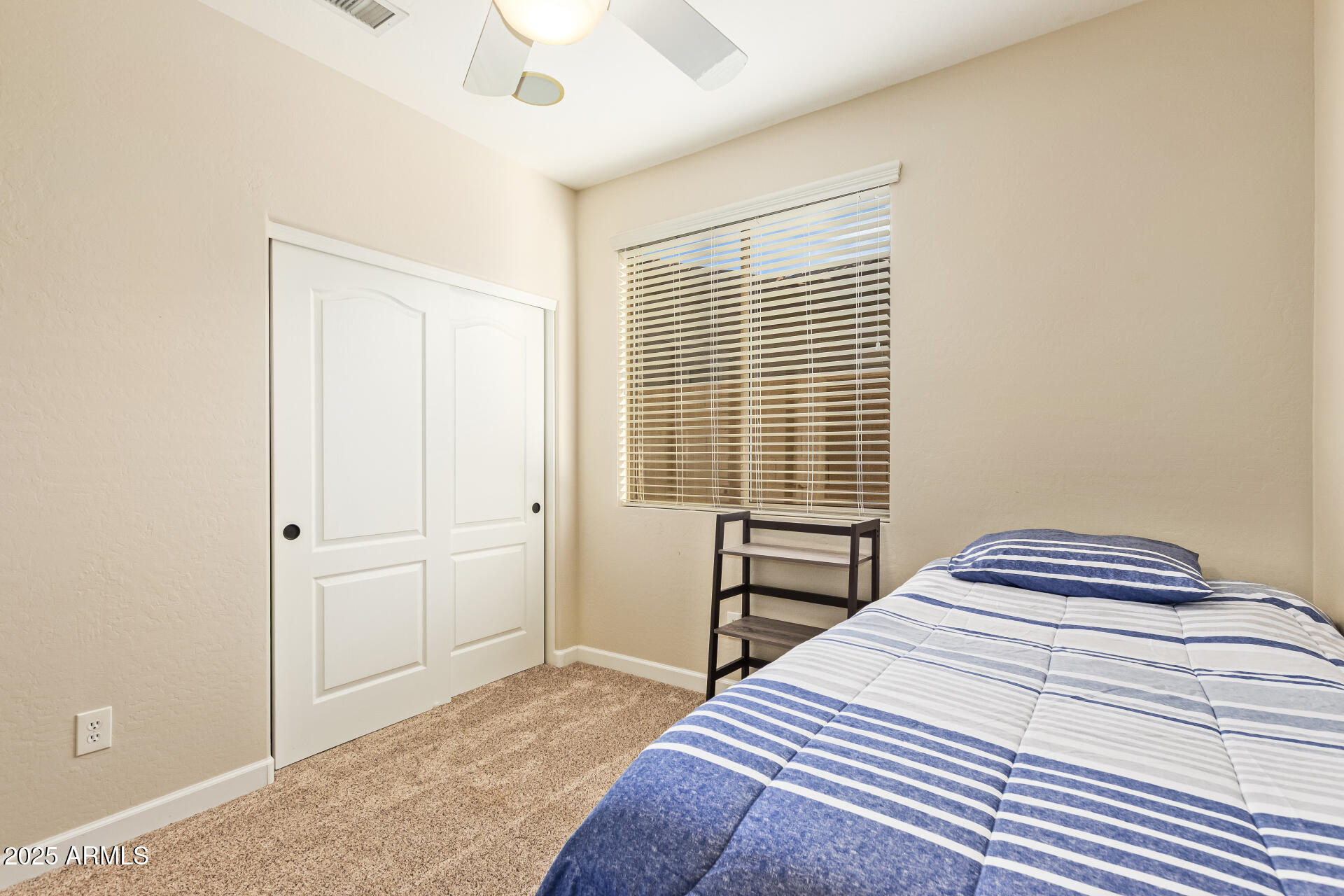 535 South Lemon Court Gilbert, AZ 85296 - Photo 25 of 36 a bedroom with a bed and a window