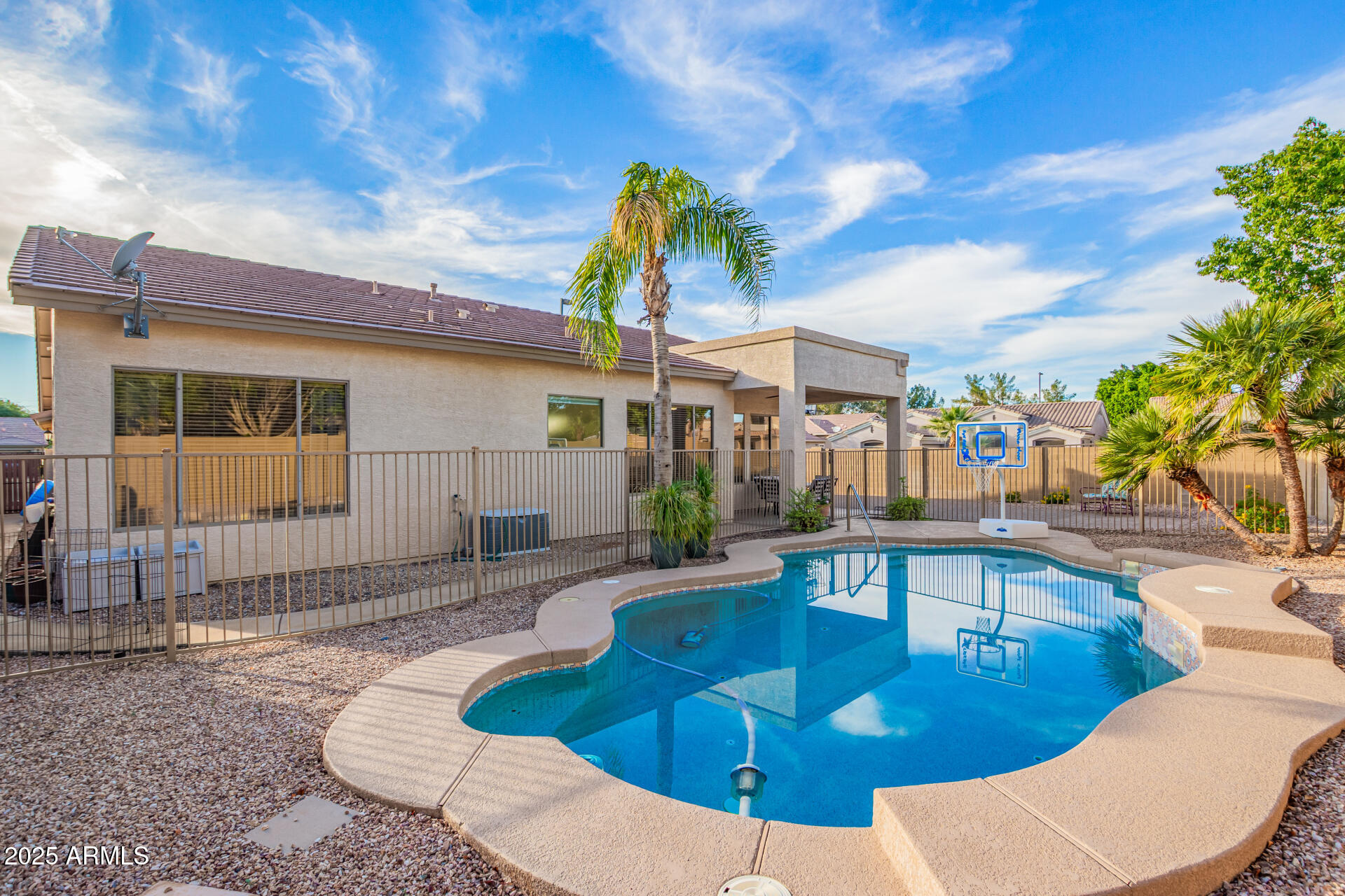 535 South Lemon Court Gilbert, AZ 85296 - Photo 28 of 36 a view of a house with swimming pool and sitting area