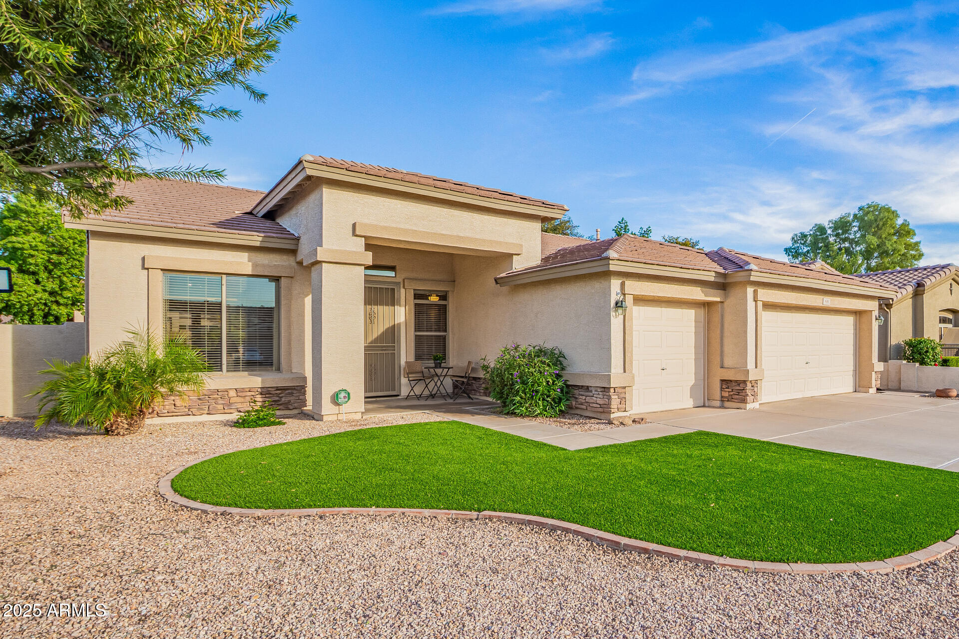 535 South Lemon Court Gilbert, AZ 85296 - Photo 32 of 36 a front view of a house with a yard and porch