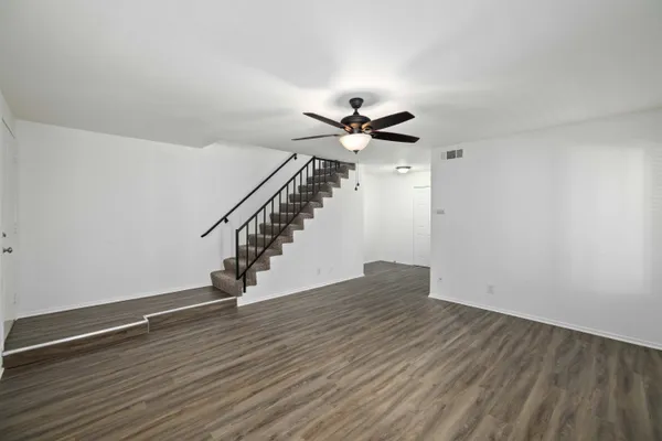 a view of entryway with wooden floor