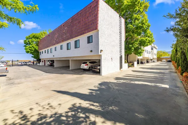 a building with trees in front of it