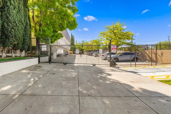 a view of a patio with swimming pool