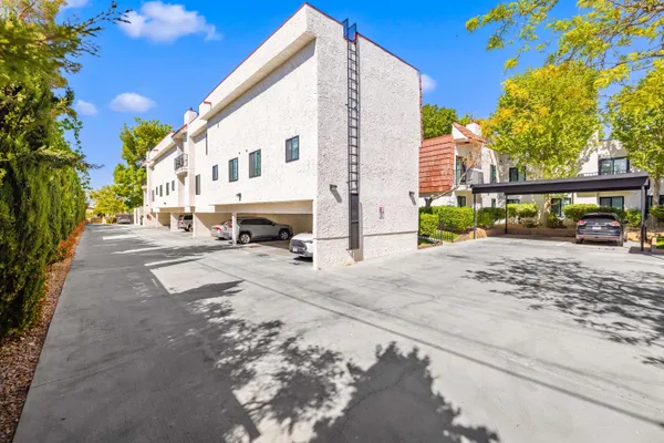a view of a street with cars
