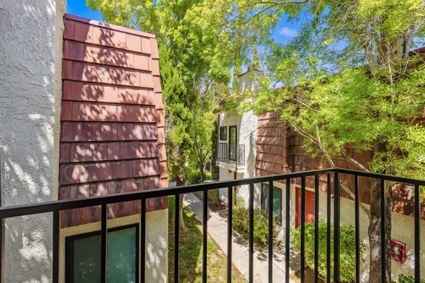 a view of a building from a balcony