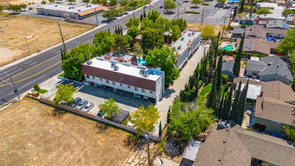 an aerial view of a house with a garden