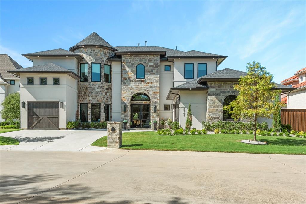 6921 Valley View Lane Dallas, TX 75240 - Photo 1 of 1 a front view of a house with a yard