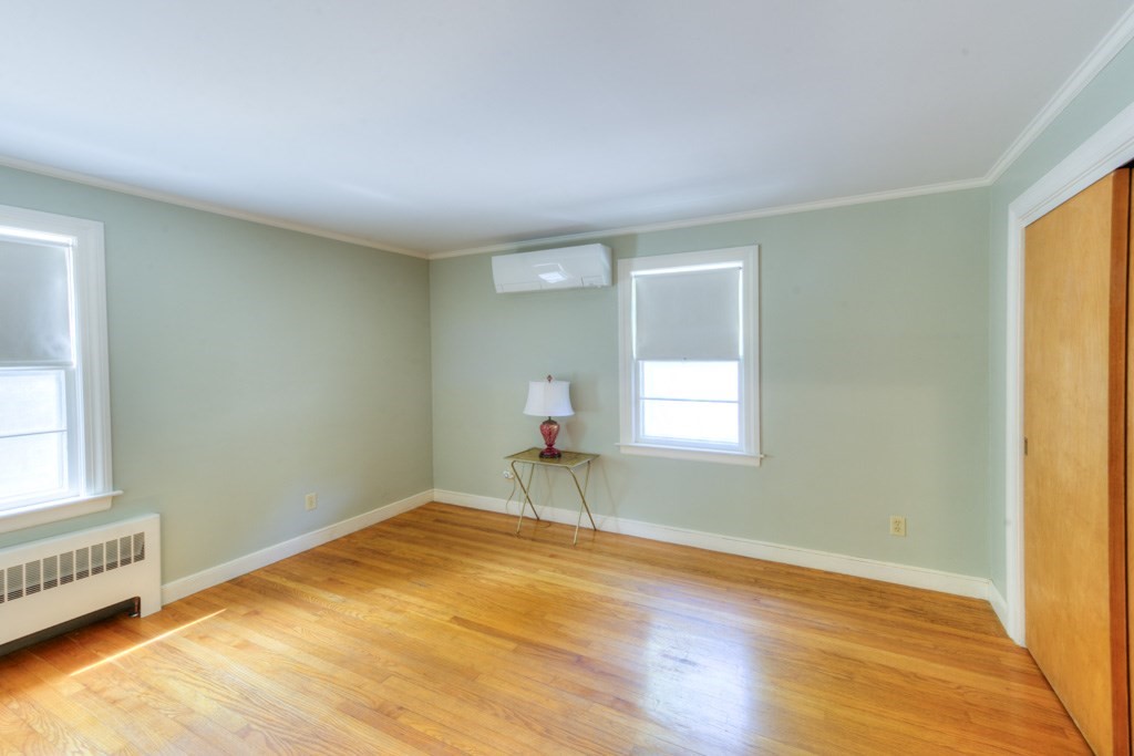 47 Kendall Road Jefferson, MA 01522 - Photo 7 of 26 a view of empty room with wooden floor and fan