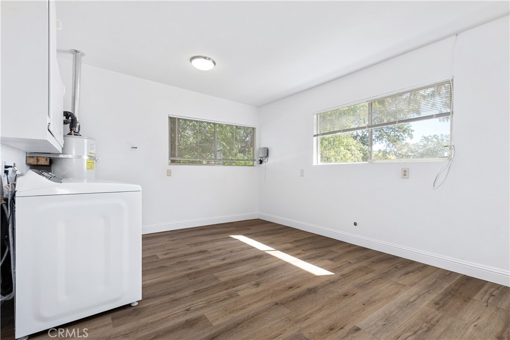 317 Crocker Street Templeton, CA 93465 - Photo 23 of 36 wooden floor in an empty room with a window