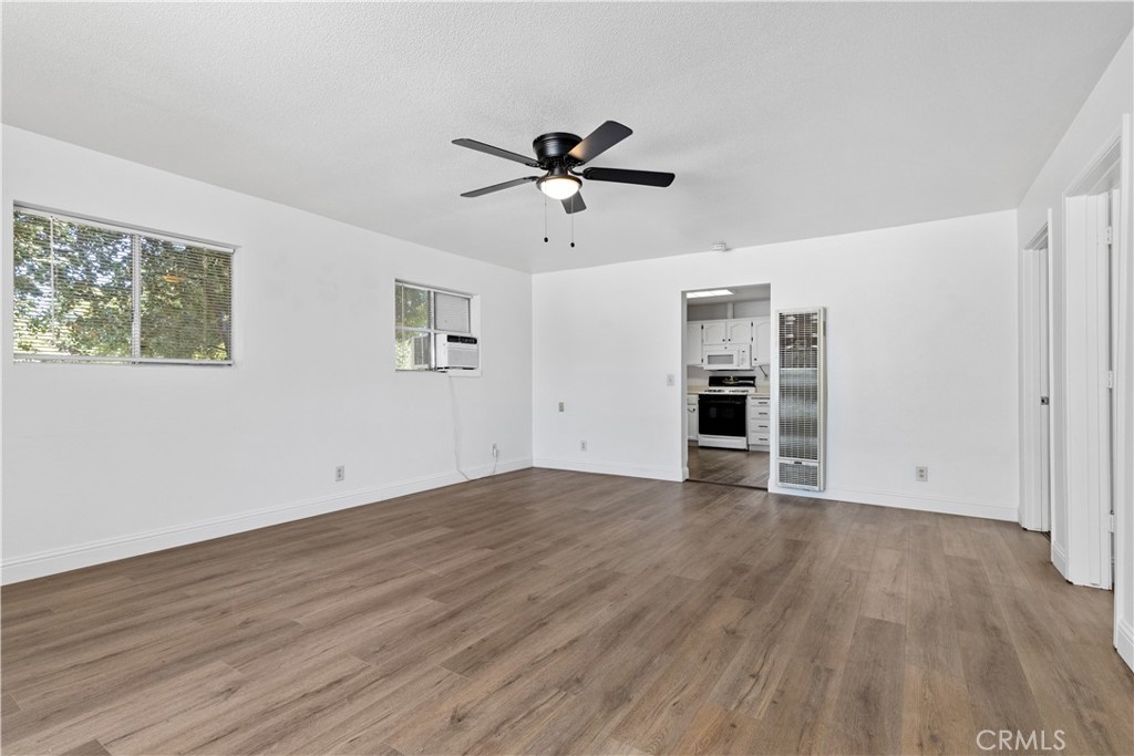 317 Crocker Street Templeton, CA 93465 - Photo 7 of 36 wooden floor in an empty room with a window