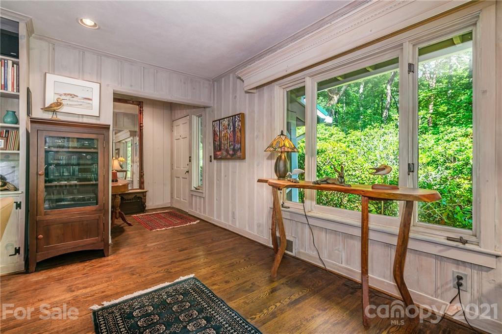811 Hunting Country Road Tryon, NC 28782 - Photo 5 of 40 a view of an entryway with wooden floor and door