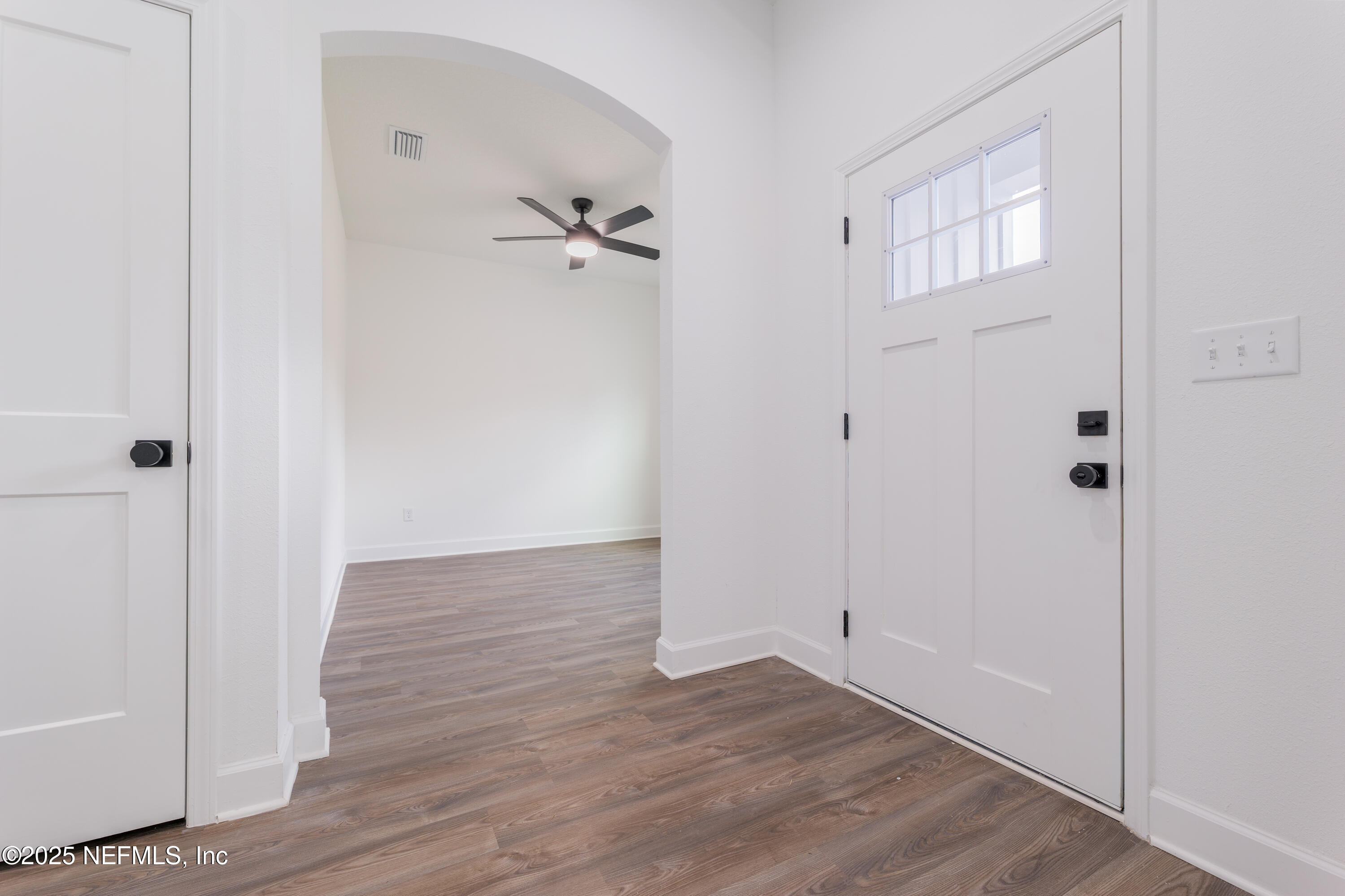 4596 Mayflower Street Middleburg, FL 32068 - Photo 7 of 31 wooden floor in an empty room
