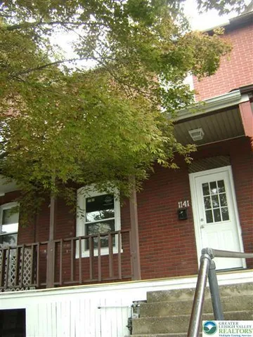 a view of a house with a large window