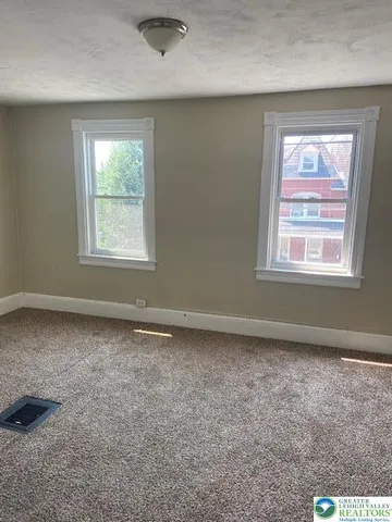an empty room with a window