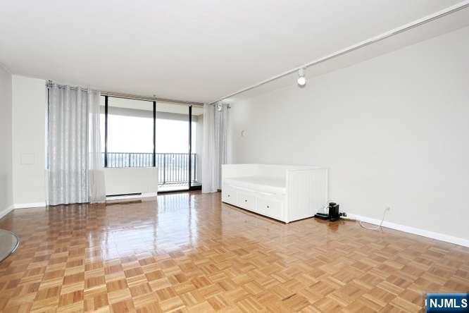 6 Horizon Road, Unit 2405 Fort Lee, NJ 07024 - Photo 15 of 42 a view of an empty room with a window