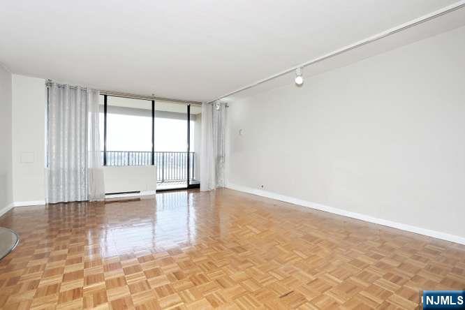 6 Horizon Road, Unit 2405 Fort Lee, NJ 07024 - Photo 17 of 42 a view of an empty room with a window