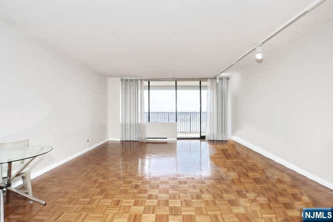 6 Horizon Road, Unit 2405 Fort Lee, NJ 07024 - Photo 18 of 42 a view of an empty room with a window