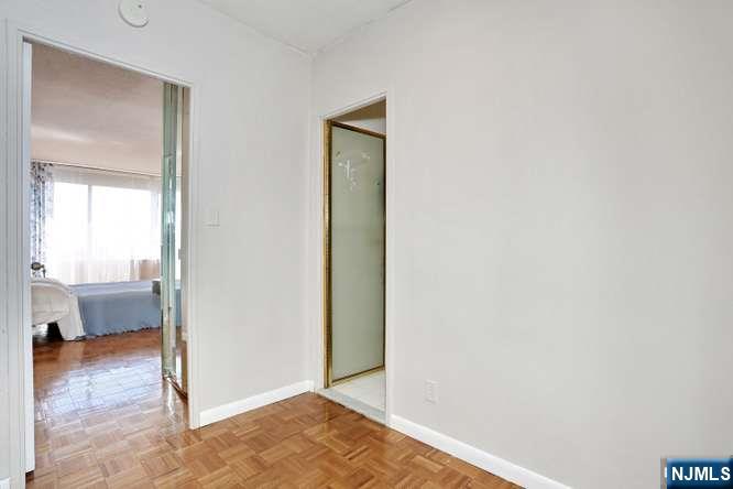 6 Horizon Road, Unit 2405 Fort Lee, NJ 07024 - Photo 21 of 42 a view of a room that has a mirror in it