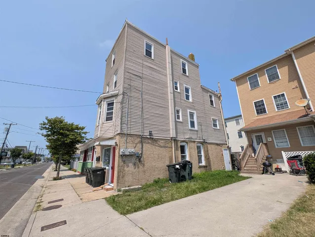 a view of a building with a street