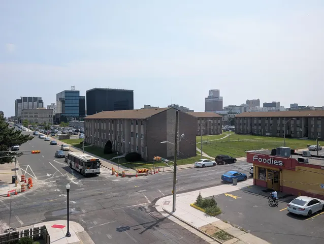 a sign board with a yard