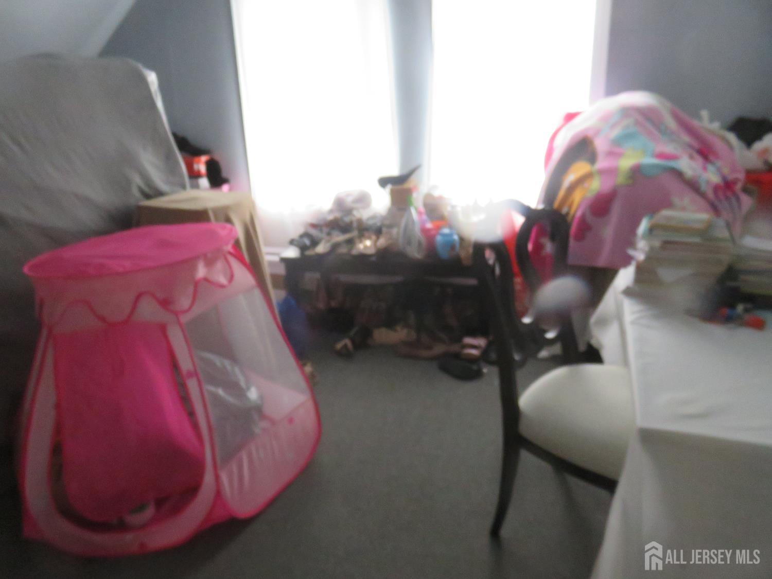 715 State Street Perth Amboy, NJ 08861 - Photo 9 of 13 a living room with furniture