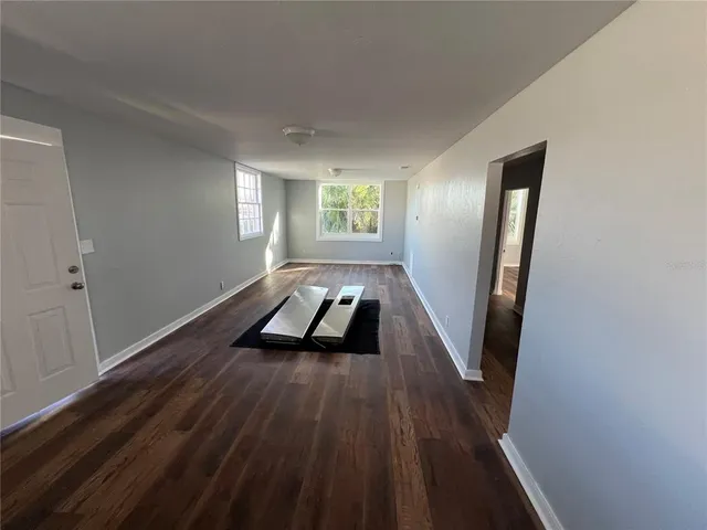 a view of entryway with wooden floor