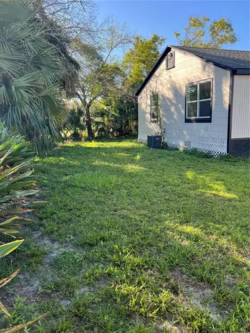 a front view of house with garden