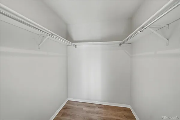 a view of an empty walk in closet