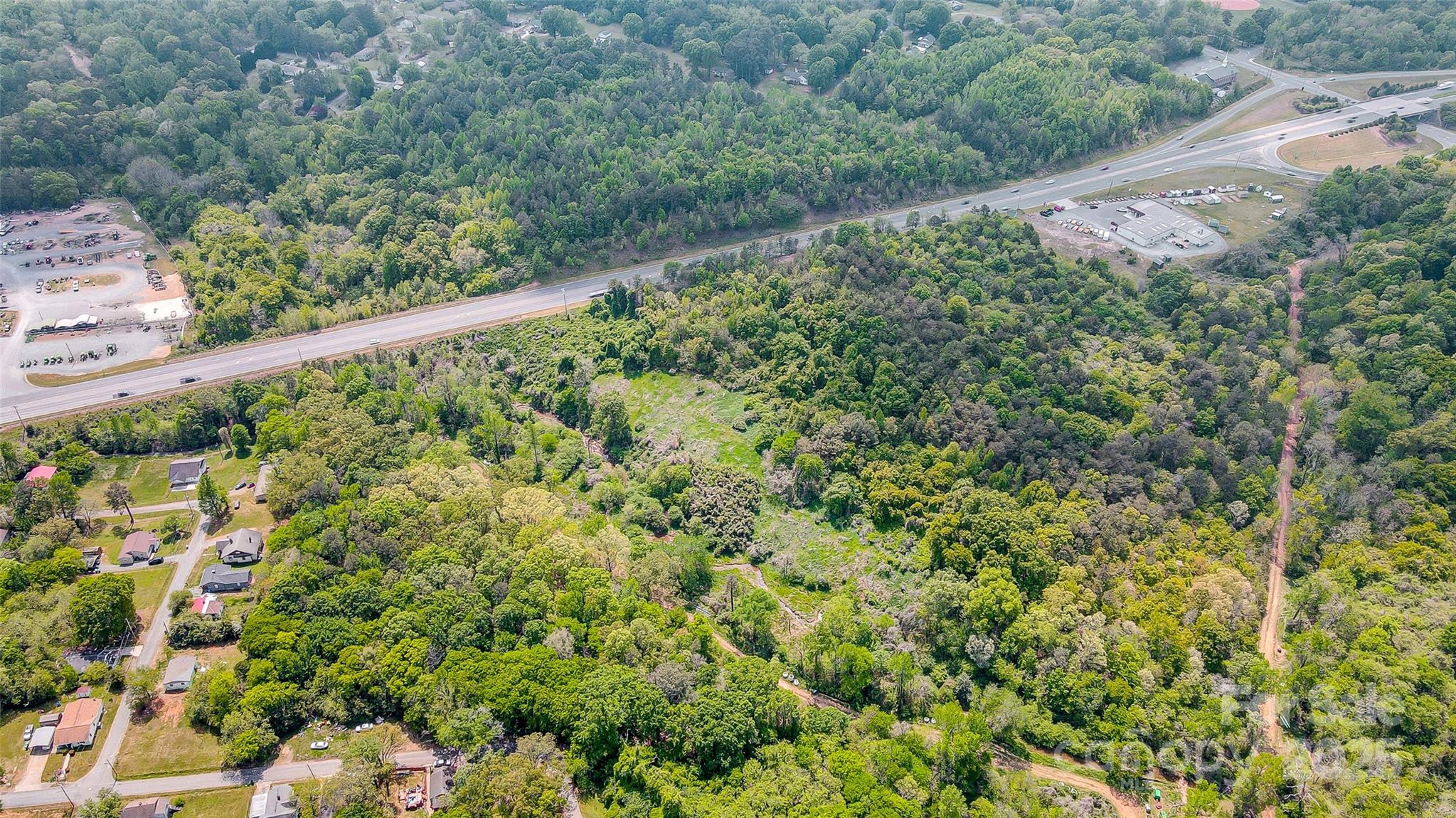 24/27 Rd Albemarle Nc 28001 Road Albemarle, NC 28001 - Photo 3 of 7 a view of a lush green forest with lots of trees