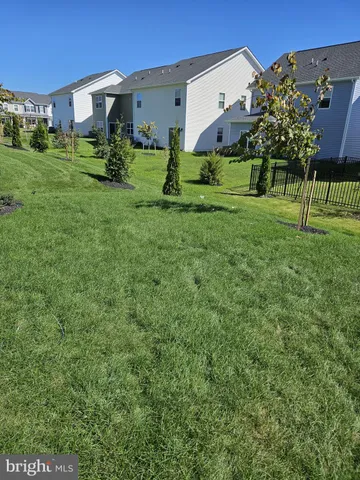 a view of a kitchen from the hallway