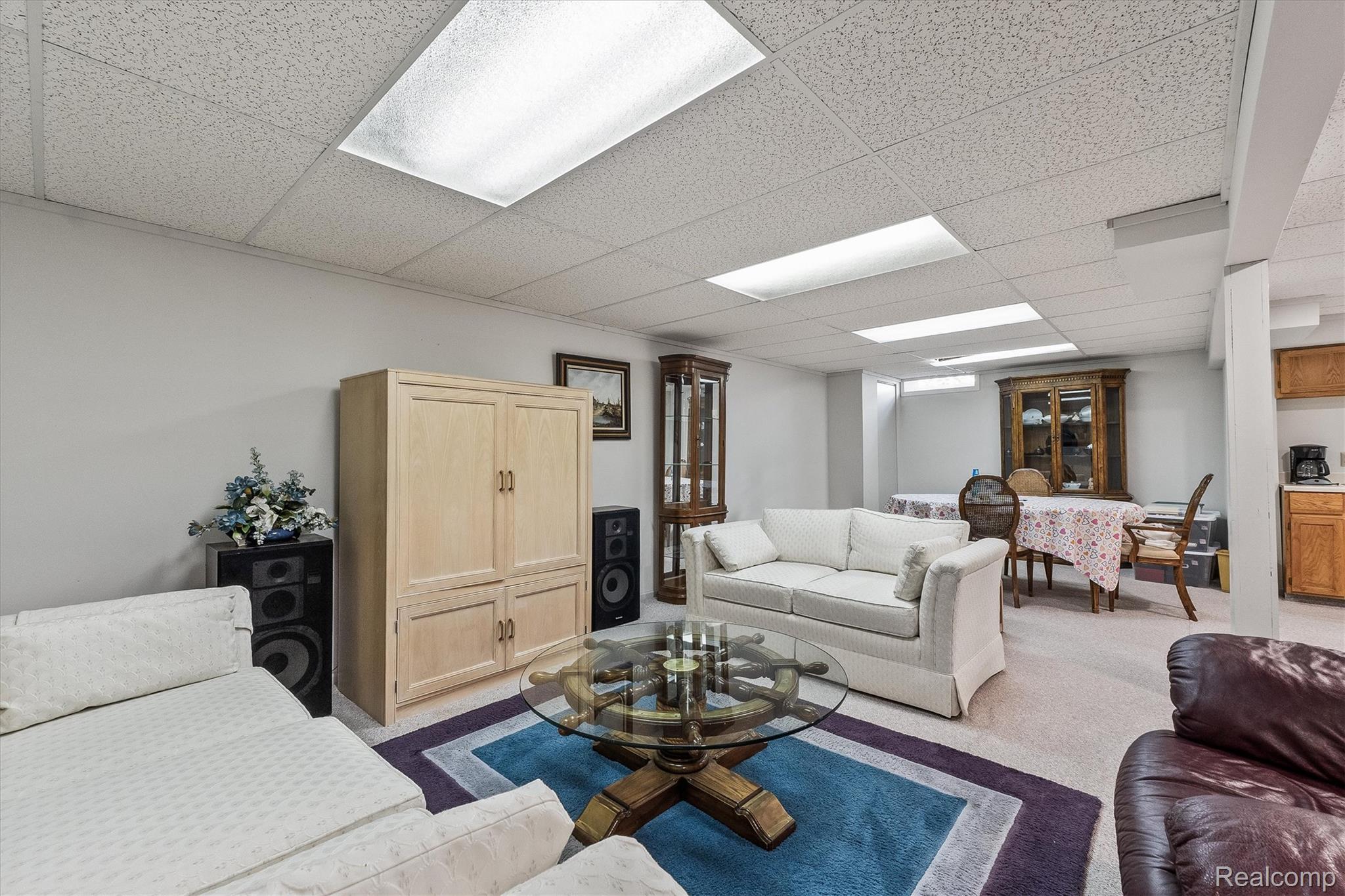 1662 Sumac Drive Rochester, MI 48309 - Photo 28 of 38 Spacious recreation room featuring recessed lighting, light-toned carpeting, and a drop ceiling