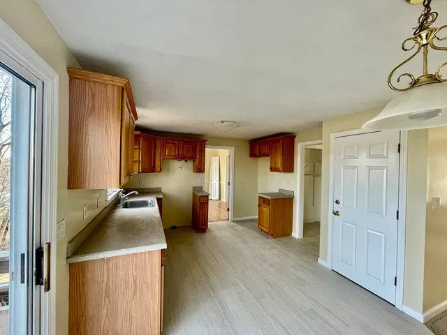 a view of a living room and hardwood floor