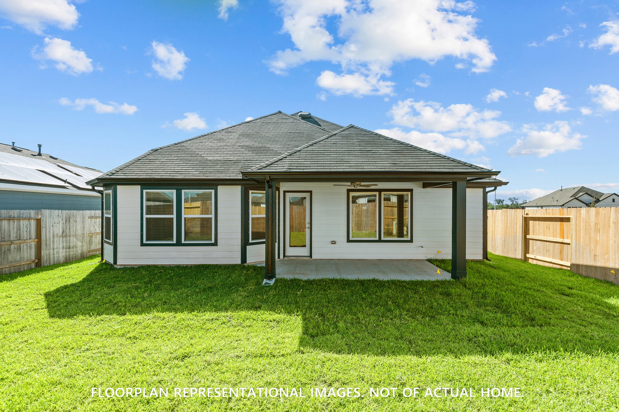 2119 Lone Bronco Boulevard Rosenberg, TX 77471 - Photo 3 of 12 a view of a house with a garden